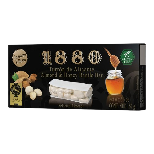 Box of 1880 Turrón de Alicante Almond & Honey Brittle Bar with honey dipper on a white background